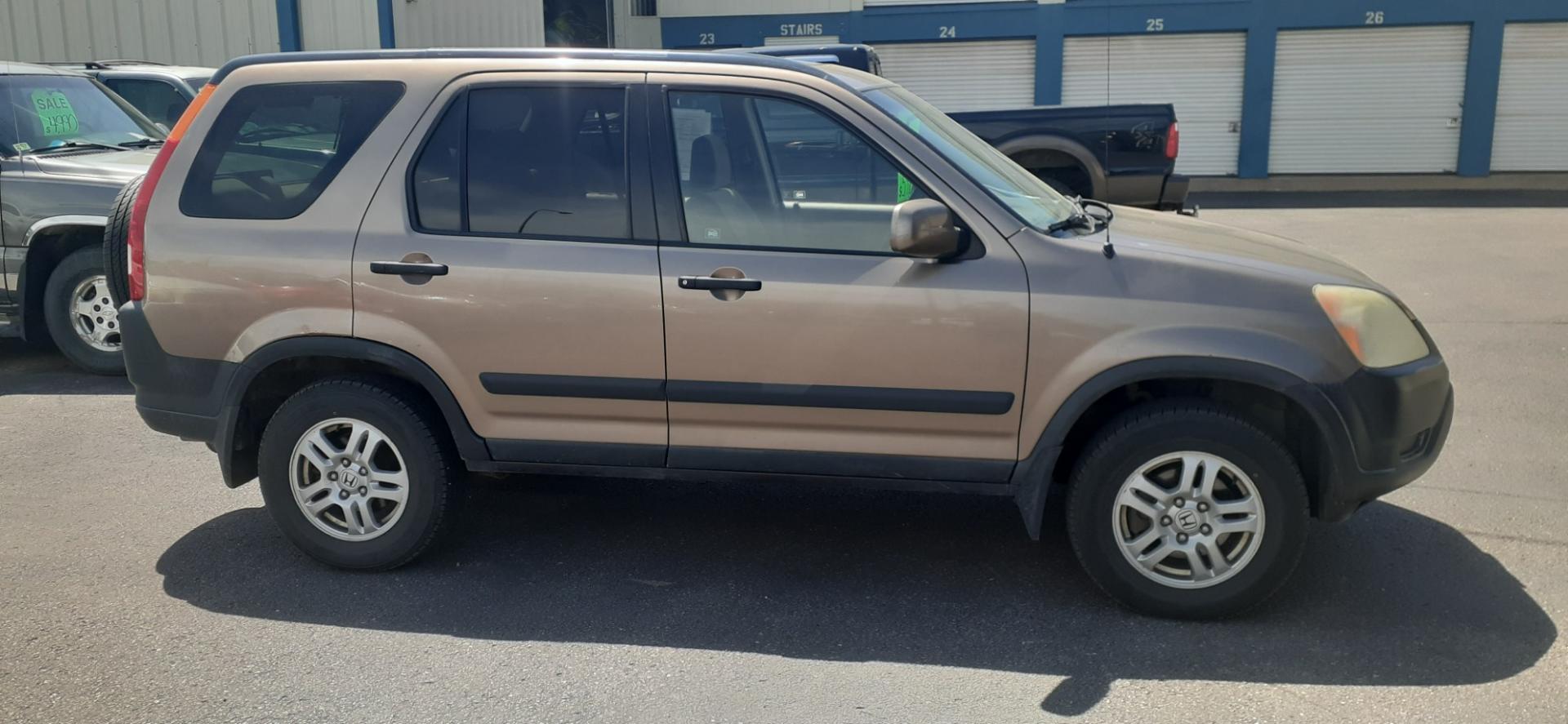 2004 Honda CR-V (JHLRD78854C) with an 2.4L L4 DOHC 16V engine, 4-Speed Automatic Overdrive transmission, located at 2015 Cambell Street, Rapid City, SD, 57701, (605) 342-8326, 44.066433, -103.191772 - CARFAX AVAILABLE - Photo#4